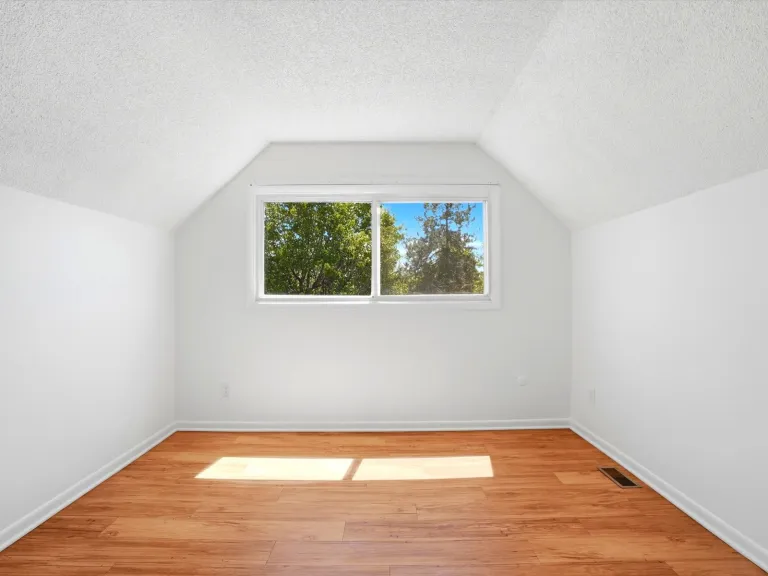 775 Bedivere Cir - Bedroom with large windows