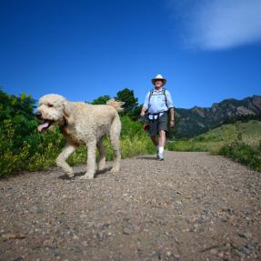 Man hiking with his dog