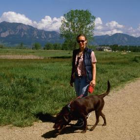 Woman hiking with her dog