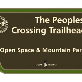 A picture of The Peoples' Crossing trailhead sign