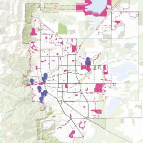 A map of Boulder with BPR properties in pink, and historic places managed by BPR marked by purple points.