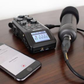 Recorder, microphone, and iPhone on a table