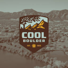 Cool Boulder logo placed on an aerial photo of the Boulder valley