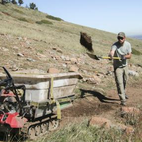 An OSMP Trail Crew member works on city open space