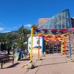 Exterior of Main Library, decorated with colorful flags for JLF