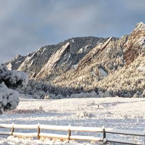 snow covering the flatirons on a wintry day