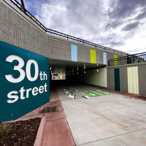 underpass at 30th Street with bright, colorful designs