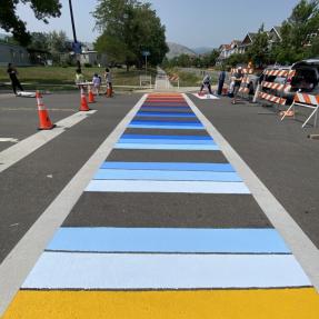 A colorful painted crosswalk in Boulder