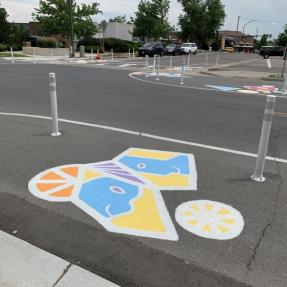Paint on pavement at a protected bike lane in Boulder