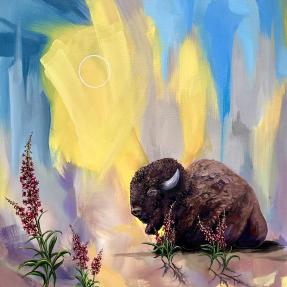 mural of a bison lying in the sun