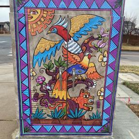 Electrical box with fictionalized nature motifs and geometric boarder 