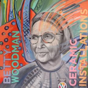 Portrait of Betty Woodman with abstract motifs in the background