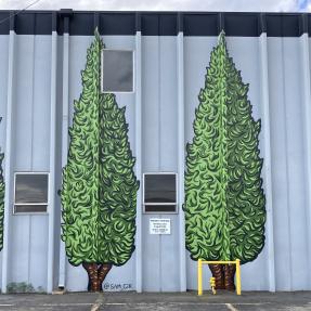 Mural of trees with fictional characteristics  