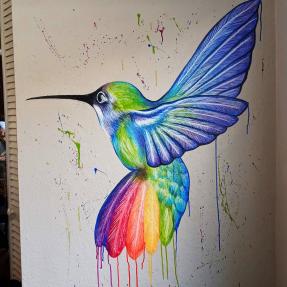 rainbow colored hummingbird 