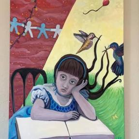 Girl leaning on a book with birds and a ballon behind her 