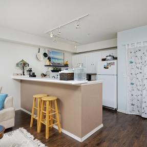 10 - 2610 Iris Ave Unit 105 - kitchen view from living space.jpg