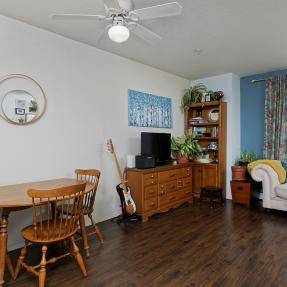 13 - 2610 Iris Ave Unit 105 - living space and dining area.jpg