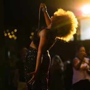 Singer performing at the Melanin Funk Fest
