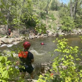Boulder Fire-Rescue during swift water rescue training near the Boulder Creek
