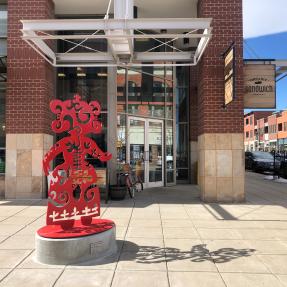 Sculpture in context with the building behind it
