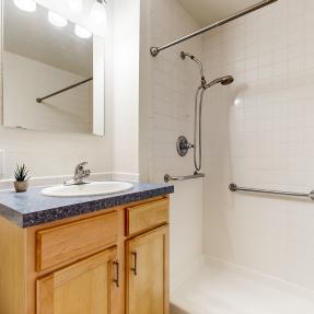 Bathroom picture with shower toilet and sink