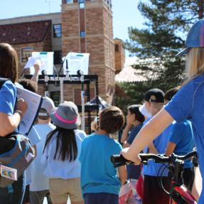 Children at a water activity at CU Boulder