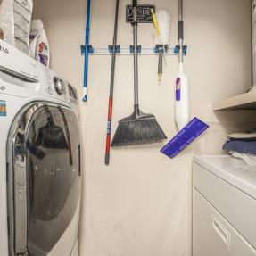 2510 Taft Unit 305 Laundry area with washer and dryer