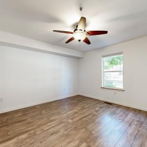 Room view with window ceiling fan