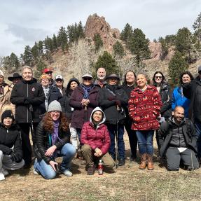 Tribal Representatives and Community Members Pose for a Group Picture