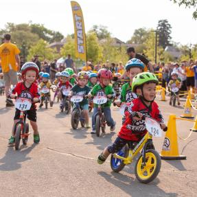 Kids racing on bicycles