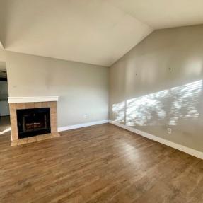 5540 Stonewall Pl 16 - Interior living room with wood burning fireplace