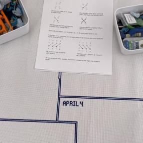 Stitching outlines on a table downtown