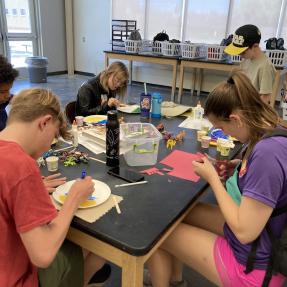 Amico campers creating an arts and crafts project