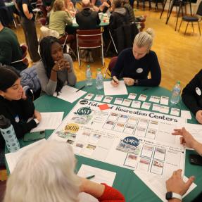 A community members participate in an engagement activity in January 2025.