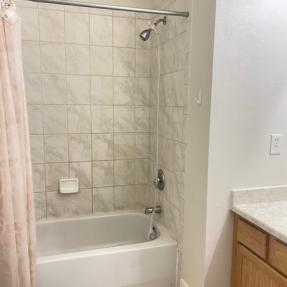 2800 E Aurora Ave # 110 Bathroom with bathtub