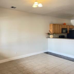 2800 E Aurora Ave #110 Living room facing kitchen
