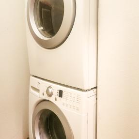 3295 Big Horn Street Laundry area with stackable washer and dryer