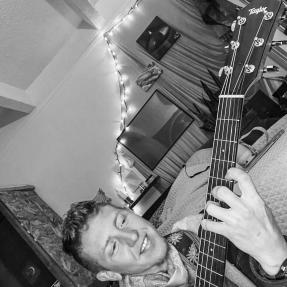 Andy plays guitar.