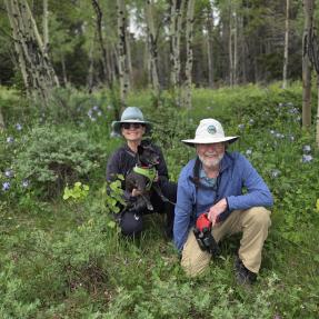 OSMP Dog Ambassadors, Don and Lisa Gillespie, with their dog Milo.