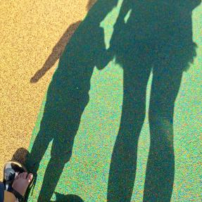 Shadow of a mother and child.