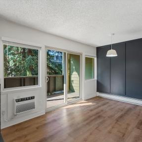 3335 Chisholm Trl 202 - Living Room to Balcony