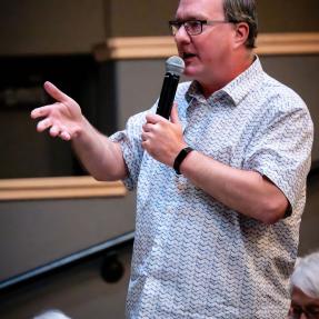 Mayor Aaron Brocket speaking during the Elevate Boulder monologue performance at Motus Theater.