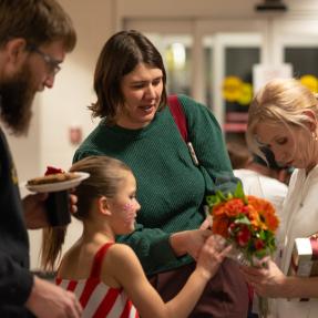 a dancer gives her teacher flowers