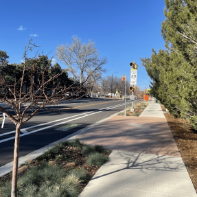 19th street sidewalk, bus stop and buffered bike lane