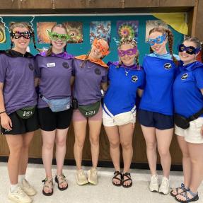 Camp Amico staff show off their super hero costumes.