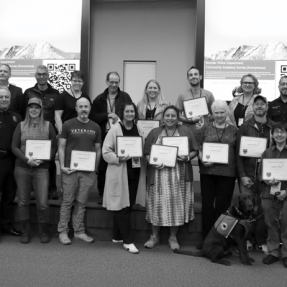 BPD Community Academy attendees smile for a photo after the completion of the academy