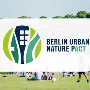 Berlin Urban Nature Pact logo superimposed in front of a park