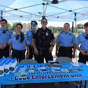 City code enforcement team running a table at What's Up Boulder event