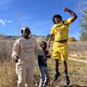 Elevate Boulder participant and her children having fun outside