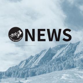 Flatirons with News in the foreground